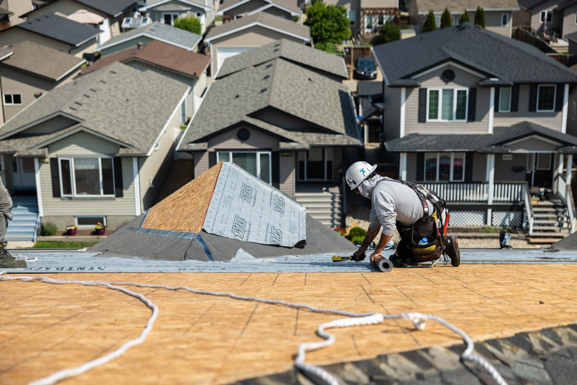 Professional roofing installation by Optimum Roofing team
