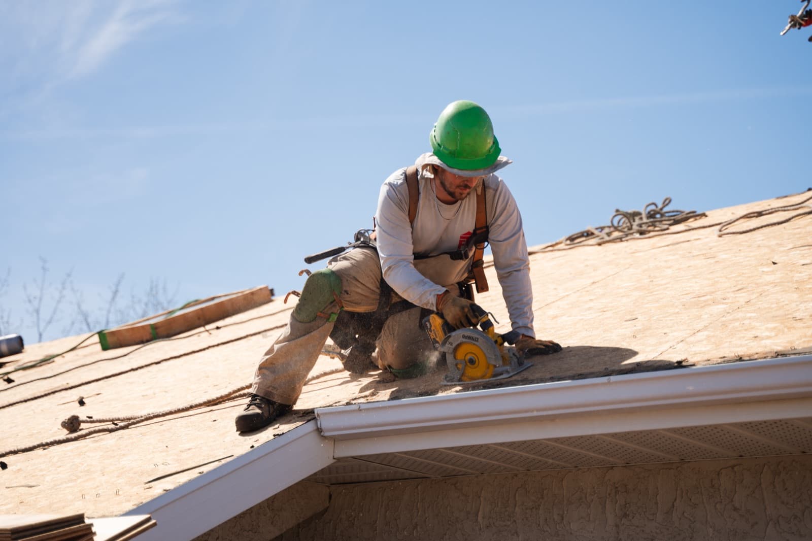 Shingle roofing crew at work in Regina