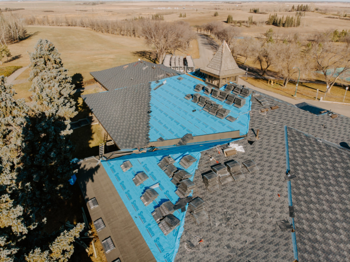 replacing the roof on Tor Hill-Optimum Roofing Regina